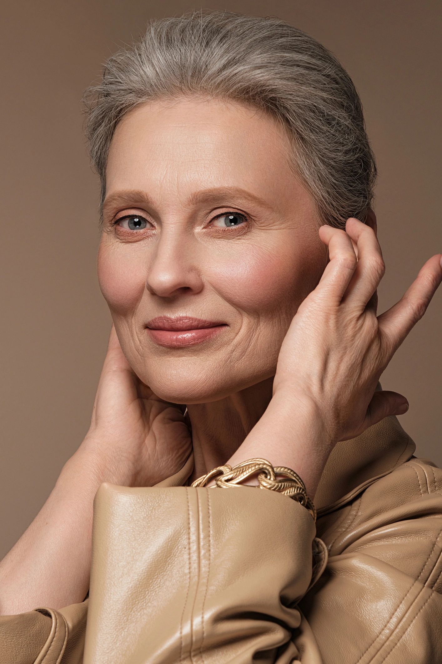 Mature woman with confident, healthy-looking skin