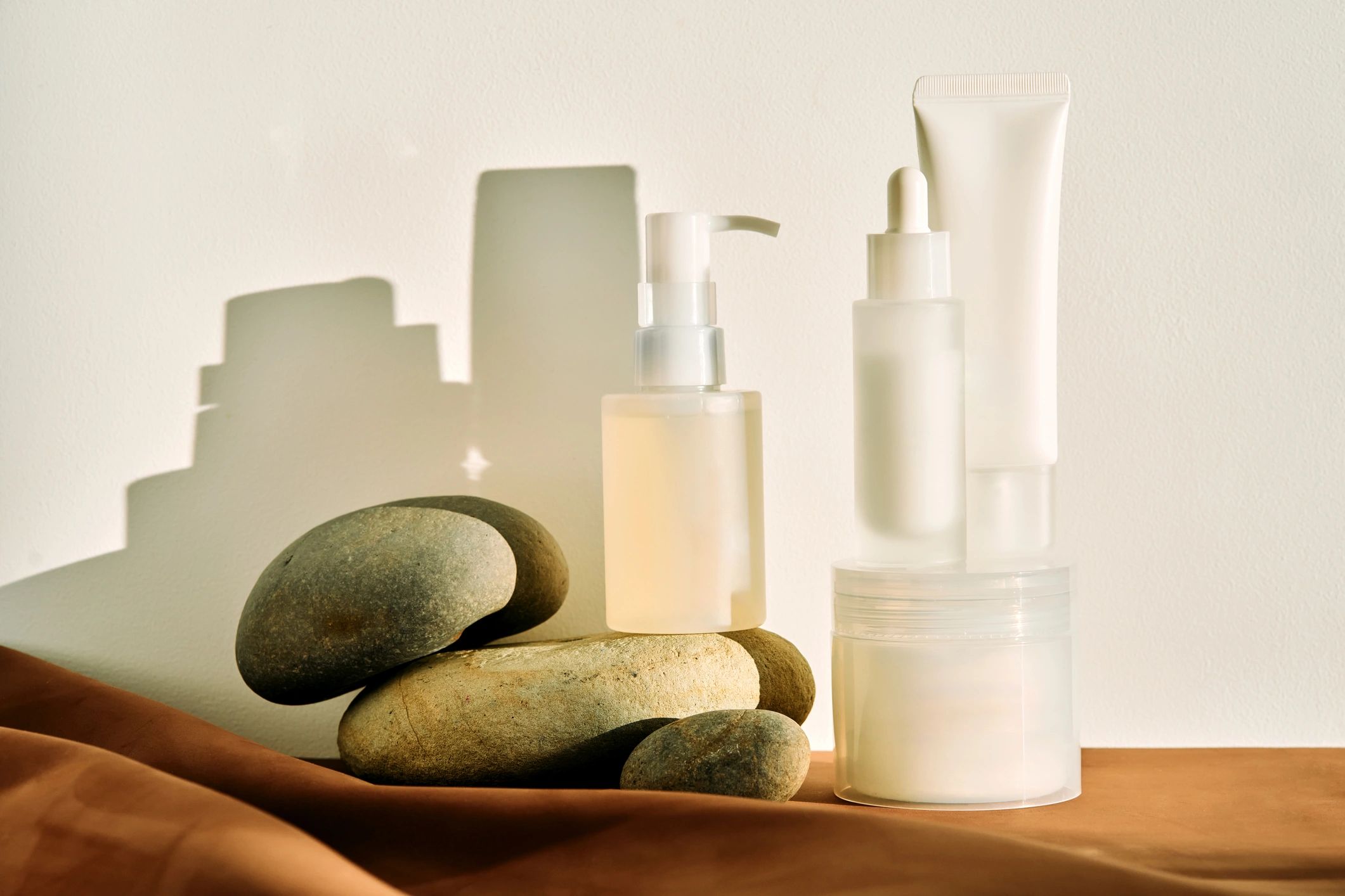Minimal premium skincare products arranged artistically